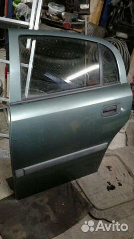 Дверь opel astra G