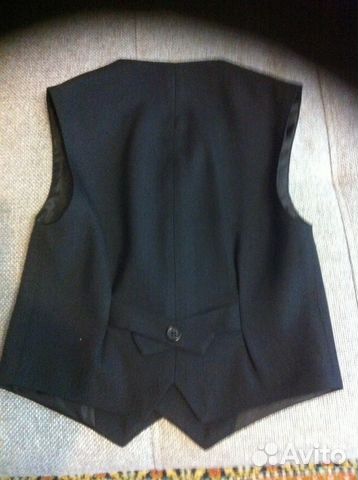 Новая жилетка, темно серая, р 30, рост 110 Новая жилетка, темно серая, р 30, рост 110
