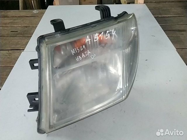 Фара оригинал Nissan Navara
