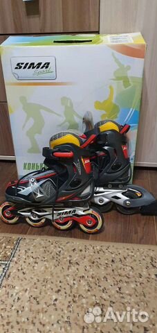 Роликовые коньки