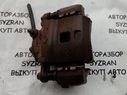 Суппорт левый Nissan Almera n15