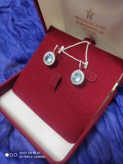 Серьги 585 пробы с голубыми вставками