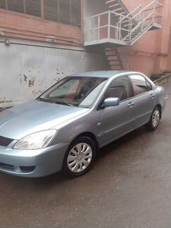Mitsubishi Lancer 1.6 МТ, 2009, 140 000 км